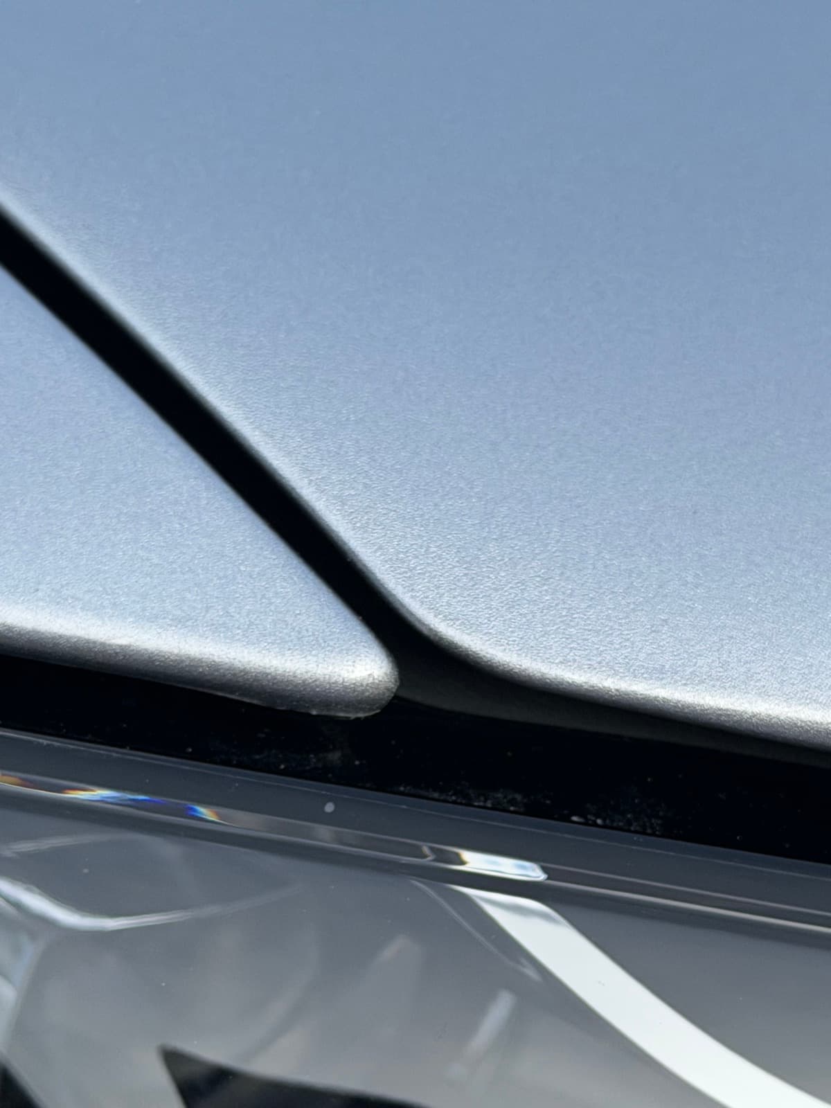 Tesla Model X panel gap with PPF edge wrapped into the seam