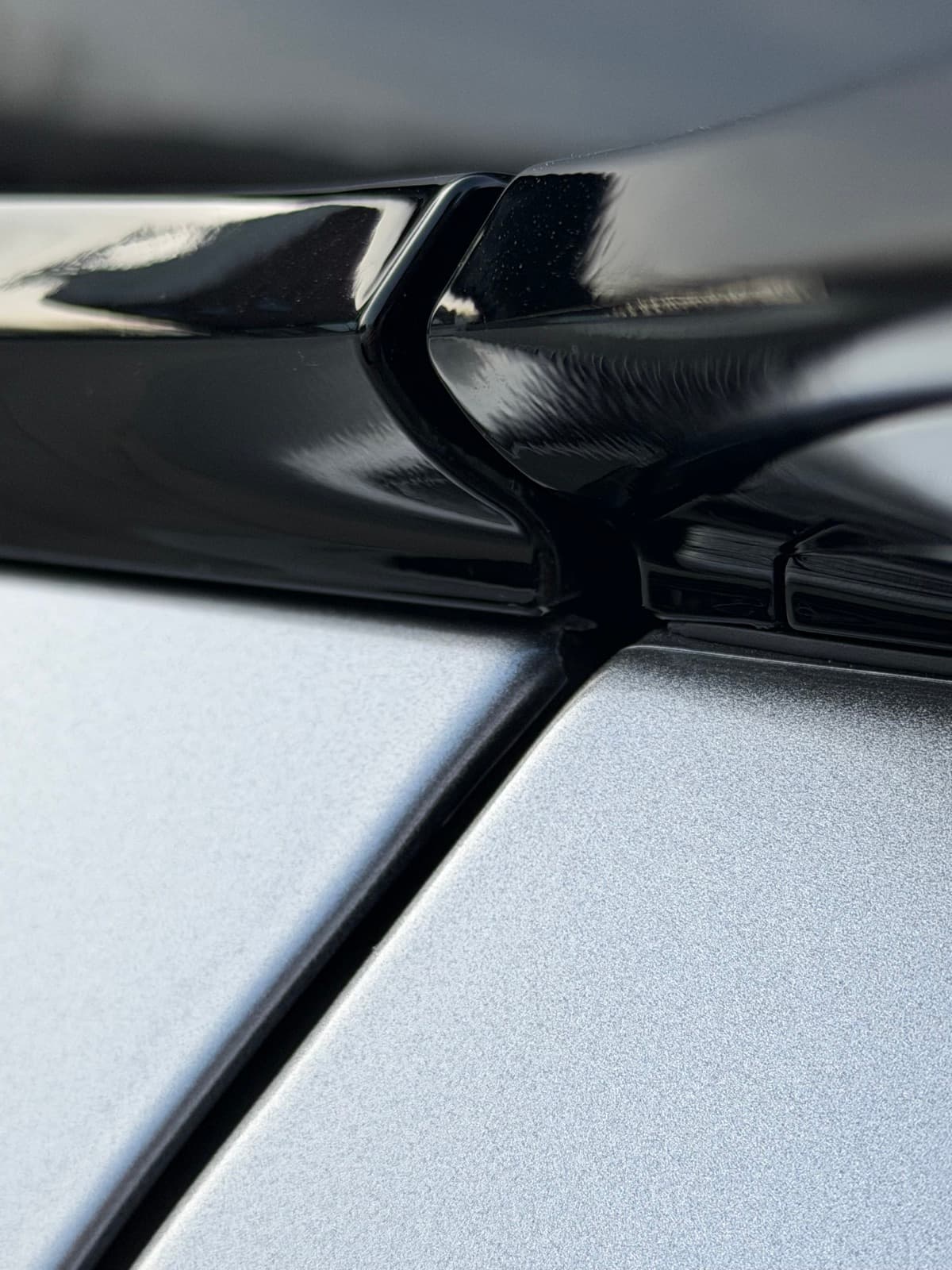 Tesla Model X side panel detail showing PPF wrap around camera housing